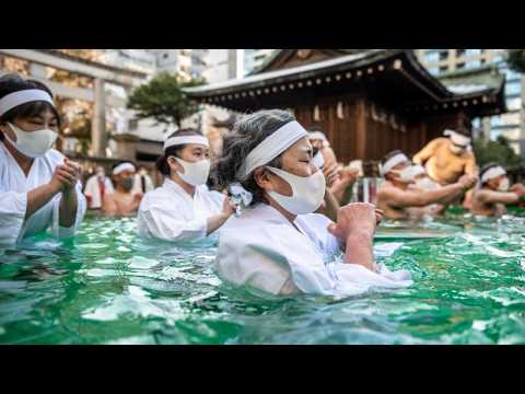Tokyo worshippers pray for good health in ice water purification ceremony