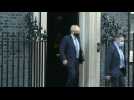 Boris Johnson leaves Downing Street to face parliament over partygate scandal