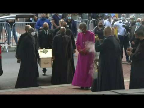 Tutu's body carried into SAfrica cathedral to lie in state
