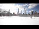 New Yorkers and tourists alike enjoy snow in Central Park