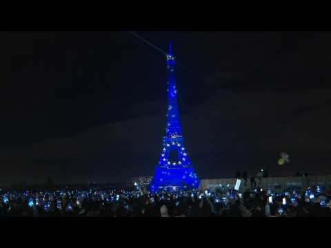 The Eiffel Tower sparkles at midnight for New Year