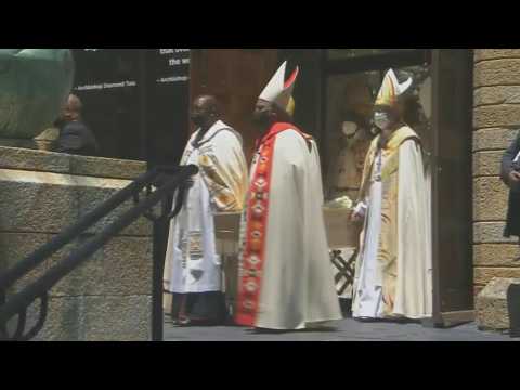 Desmond Tutu's coffin leaves cathedral after funeral in Cape Town