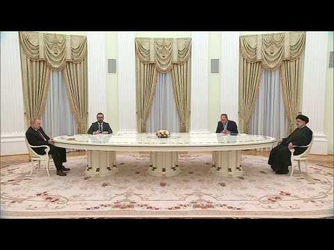 Russian President Putin hosts his Iranian counterpart Raisi