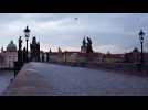 Watch as a tourist illegally drives over Prague's iconic Charles Bridge - then gets fined