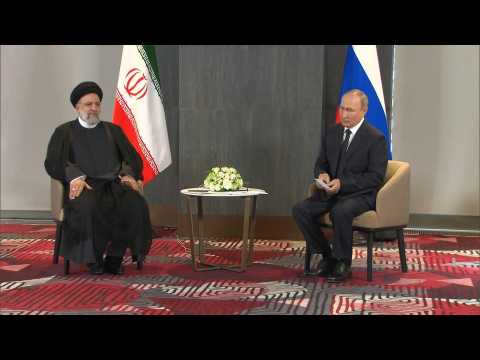 Russia's Putin meets Iranian counterpart Raisi