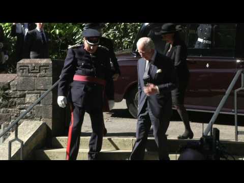 Charles and Camilla arrive at service in Cardiff for the Queen