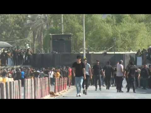 Iraqis gather outside Green Zone after Shiite cleric Sadr announces politics exit