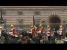Members of King's Life Guards ride in front of Buckingham Palace following Queen's death
