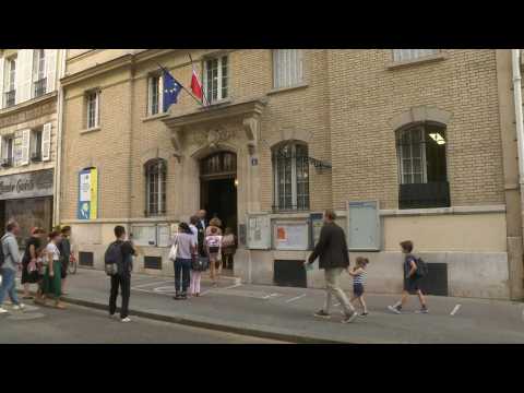 Parisian schoolchildren go back to school after two-month holiday