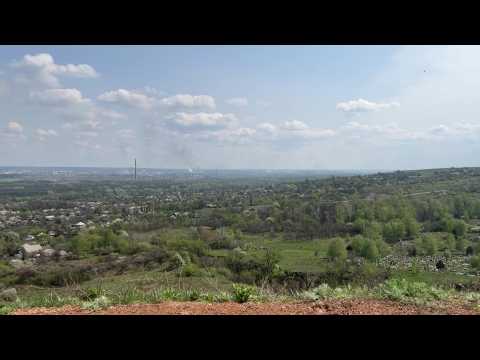 Smoke billows in the Ukrainian city of Rubizhne where fighting continues