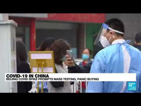 Beijing Covid-19 spike prompts mass testing, panic buying