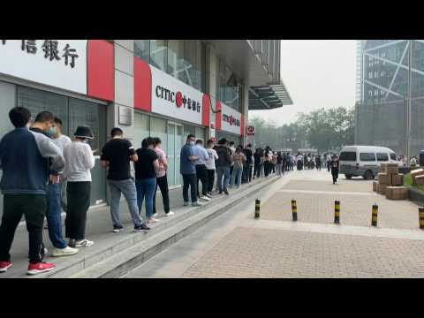 Beijing residents queue for mass Covid testing as cases spike