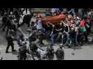 Israel police beat pallbearers at Al Jazeera journalists's funeral