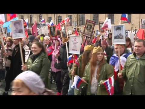 Moscow: Russians parade holding portraits of ancestors killed in WWII