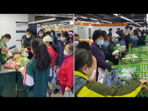 Panic buying grips Beijing supermarket after lockdown rumours