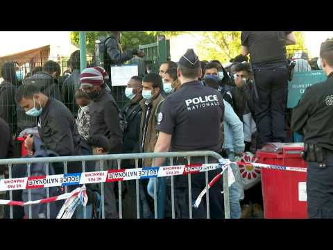 French police dismantle migrant camp near Paris