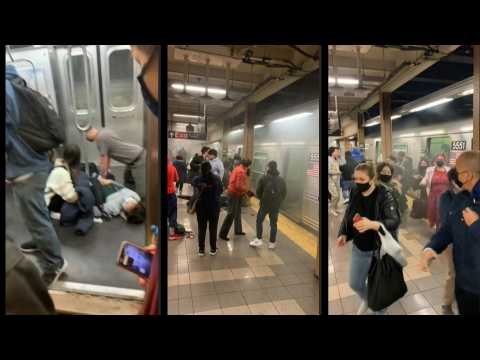 Scene from Brooklyn subway after man in gas mask shoots 10 people
