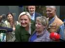 Marine Le Pen takes selfies with supporters in Paris