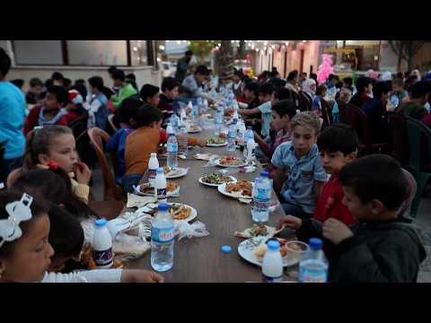 Turkish charity holds iftar for Syrian orphans in war-torn Idlib