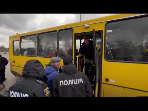 Mariupol evacuees arrive by bus in south-eastern Ukraine