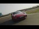 Porsche 911 Carrera 4 GTS Coupe in Lava Orange Driving Video