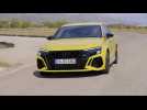 The new Audi RS 3 Sedan Python yellow on the race track
