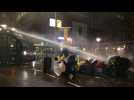 Dutch police use water cannon on Covid protesters