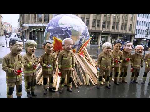 Activists dress as world leaders in COP26 protest