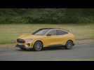 The new Ford Mustang Mach-E in Yellow Driving Video