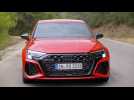 The new Audi RS 3 Sportback in Tango red Driving Video