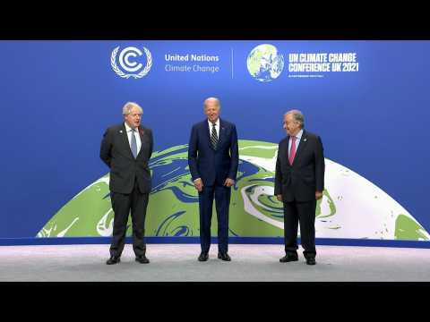 Boris Johnson and Antonio Guterres welcome Joe Biden to COP26