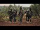 Des rebelles syriens soutenus par la Turquie s'exercent au combat à Afrine