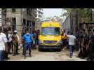 Ambulances evacuate 2 survivors pulled from collapsed Nigeria building