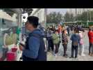 Beijing residents queue for tests as China battles new Covid outbreak