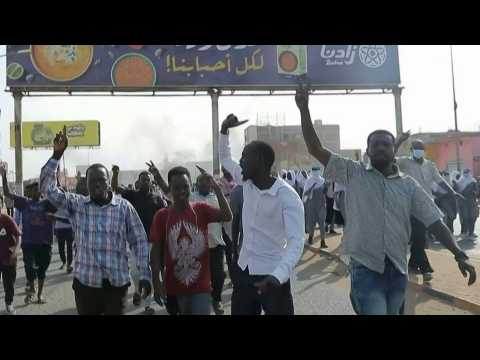 Anti-military protestors block roads and gather in streets of Khartoum