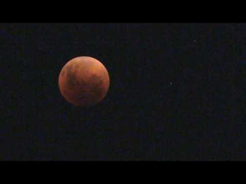 Total lunar eclipse underway in Chile