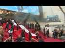 Cannes: Feminist collective deploys banner, smoke bombs on red carpet