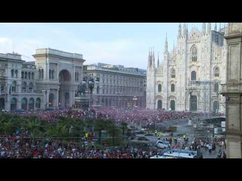 AC Milan suporters celebrate in front of Duomo in Milan