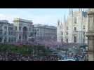 AC Milan suporters celebrate in front of Duomo in Milan