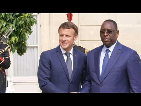 French President Emmanuel Macron welcomes his Senegalese counterpart at the Elysee Palace