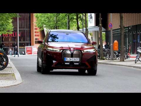 The BMW iX M60 in Red Driving Video