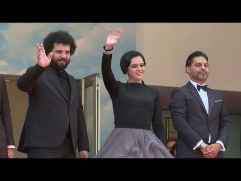 Cannes: Cast and crew of "Leila's Brothers" by Iran's Saeed Roustaee on the red capet