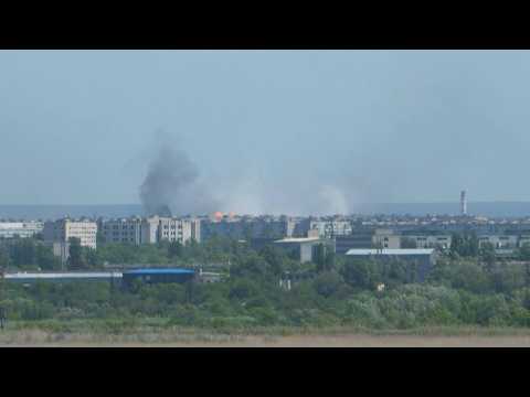 Smoke rises over Severodonetsk as war in east Ukraine at 'maximum intensity'