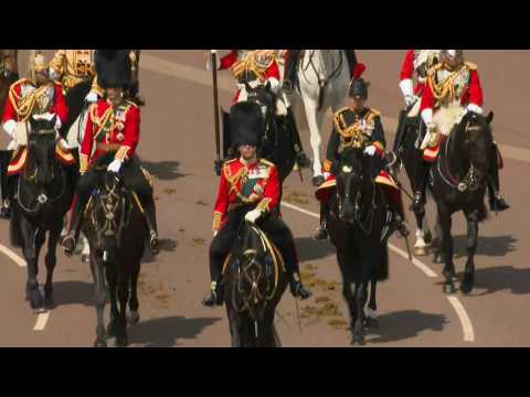 Prince Charles, Prince William and Princess Anne leave Buckingham Palace on horseback