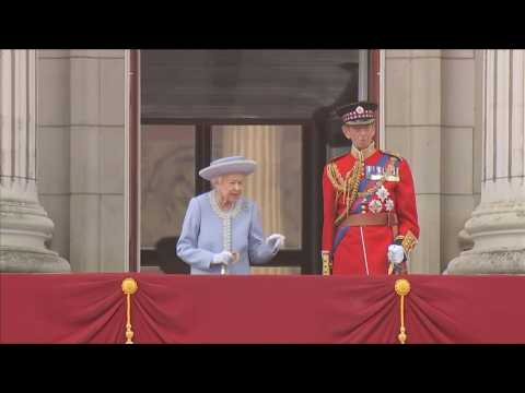 Queen Elizabeth II goes back into palace after balcony appearance
