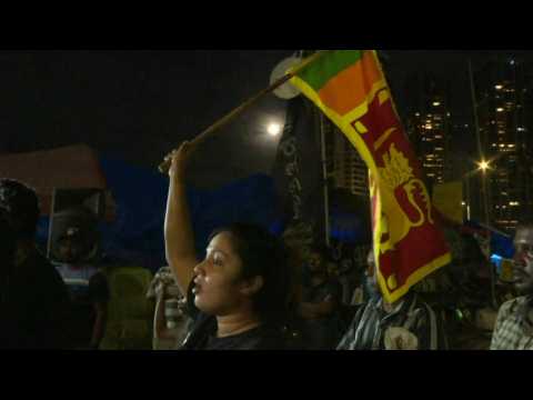 Protesters in Colombo celebrate Sri Lankan president's resignation