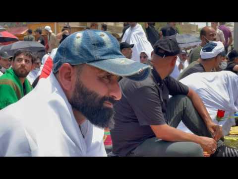 Supporters of Iraqi Shiite cleric Muqtada al-Sadr attend Friday prayers