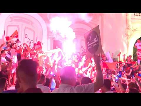 Supporters of Tunisian president Kais Saied celebrate