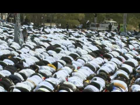 Supporters of Iraqi cleric Moqtada Sadr attend collective Friday prayer