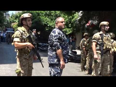 Security forces gather outside Lebanon bank as client holds staff hostage